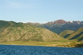 Луч вечернего солнца на холмы берега Бухтармилища